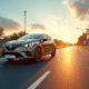 Renault Clio moderne sur route ensoleillee avec systemes de securite
